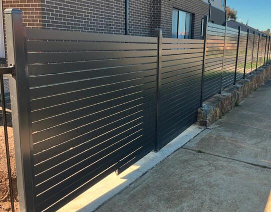 Aluminium Slat Fence – Pakenham, Monument Vertical Design aluminium slat fence Monument vertical design installed in Pakenham