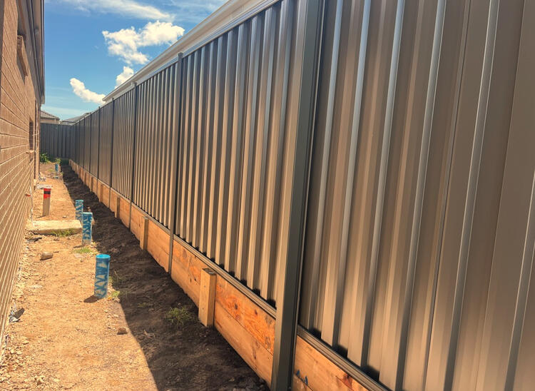 Colorbond fence Woodland Grey with double sleepers installed in Officer